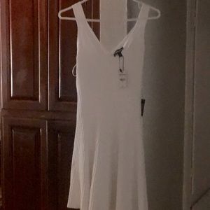 This fit and flare style comes with a sleek v-neck never wore